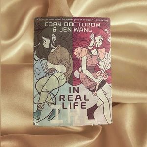 Book Name- In Real Life  Author-Cory Doctorow & Jen Wang        SLIGHTLY USED